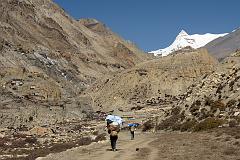 11 Phu Village, Porters On Trail, Chako Above Tashi Lhakhang Gompa From Trail Near Phu 